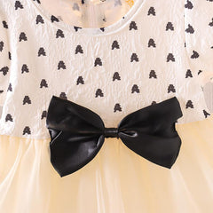 Adorable Black Bow Dress with Ruffle Hem - Baby Girls' Fashionable Outfit