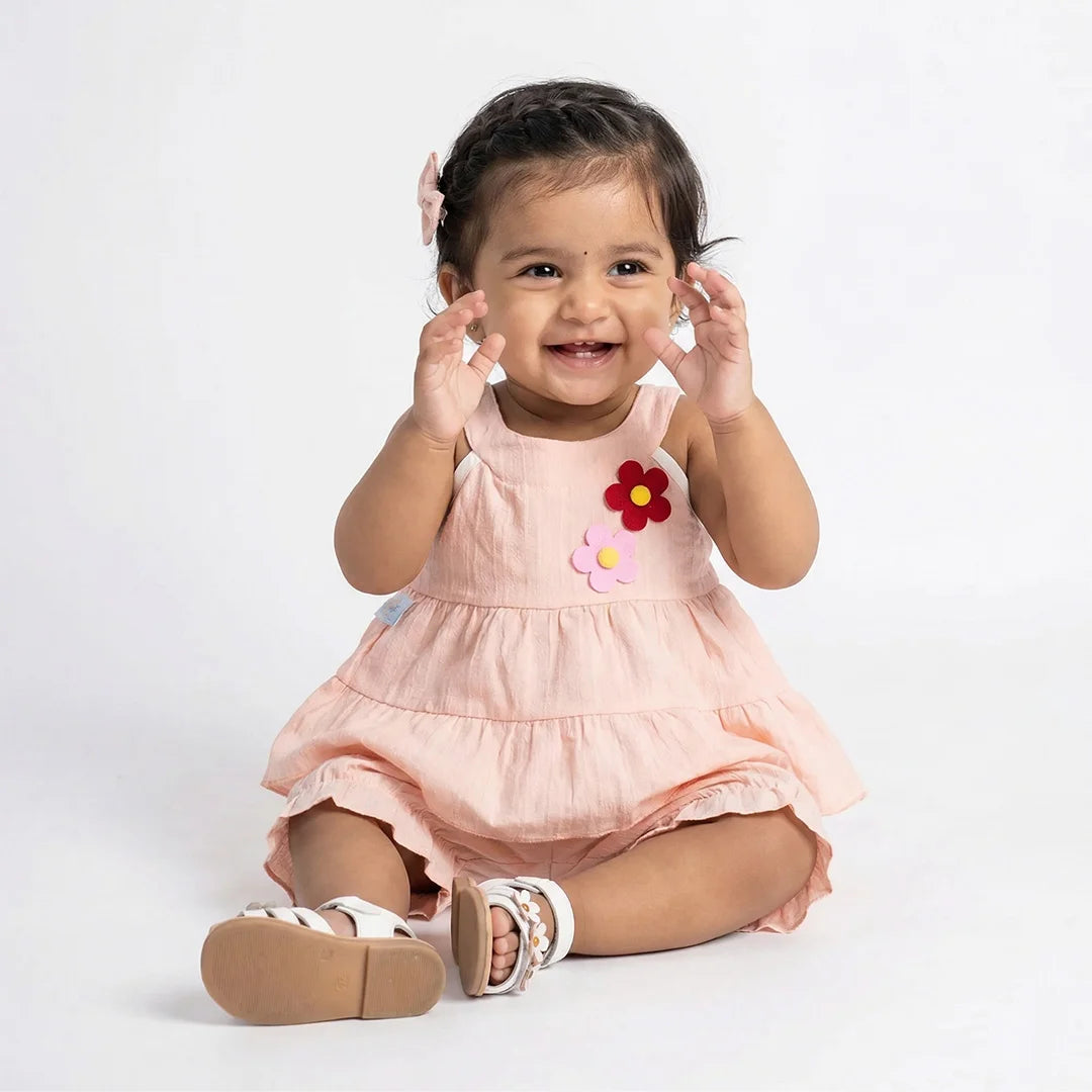 Peach Ruffled Romper with Flower Applique - Adorable Toddler Outfit