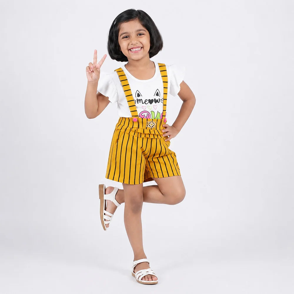 Cat-themed baby romper with yellow suspenders and ruffle trim