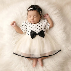 Adorable Black Bow Dress with Ruffle Hem - Baby Girls' Fashionable Outfit