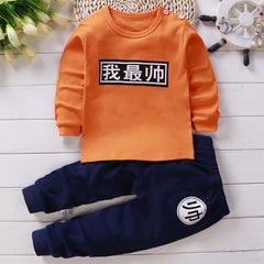 Chic Orange Long Sleeve Baby Jumpsuit with Mandarin Writing and Blue Pants Set.